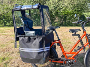 Siège enfant et protection pluie